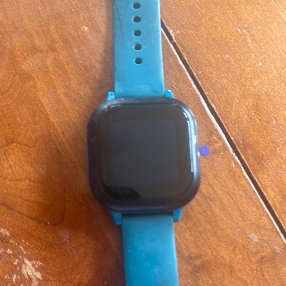 Blue Smartwatch with Perforated Strap and Square Display